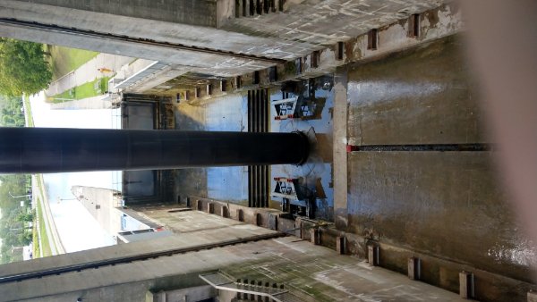 The massive hydraulic cylinders that raise and lower the basins