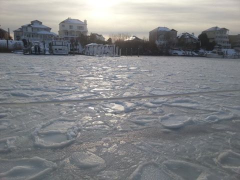 Frozen channel by the boat