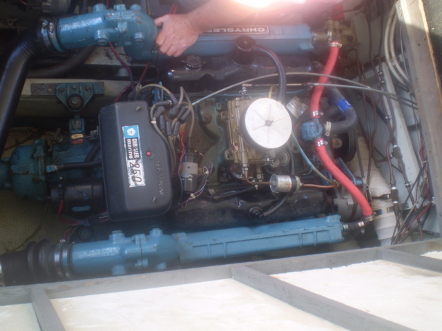 where is engine main harness plug in this pic and does alt. charge power go thru it to the batteries