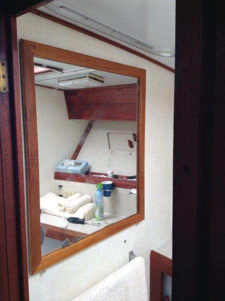 mirror frame....next year I'll have to change the mirror, but that will come with replacing the wall paper in behind first, probably with a teak veneer